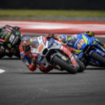 Jack Miller (cuarto) lidera la carrera 18 vueltas.